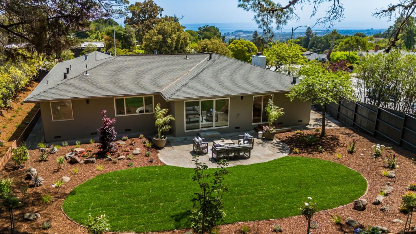 1807 Hunt Drive Burlingame, CA 94010 - Photo 39 of 46 a view of a house with backyard sitting area and garden