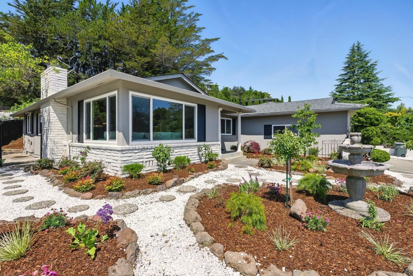 1807 Hunt Drive Burlingame, CA 94010 - Photo 40 of 46 a front view of a house with garden