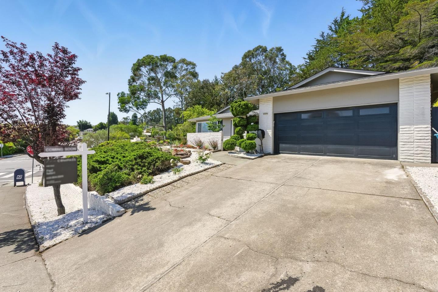1807 Hunt Drive Burlingame, CA 94010 - Photo 42 of 46 a front view of a house with garden