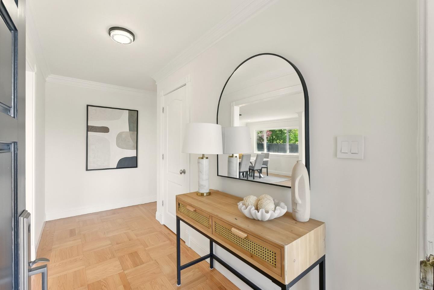 1807 Hunt Drive Burlingame, CA 94010 - Photo 5 of 46 a living room with furniture and a mirror