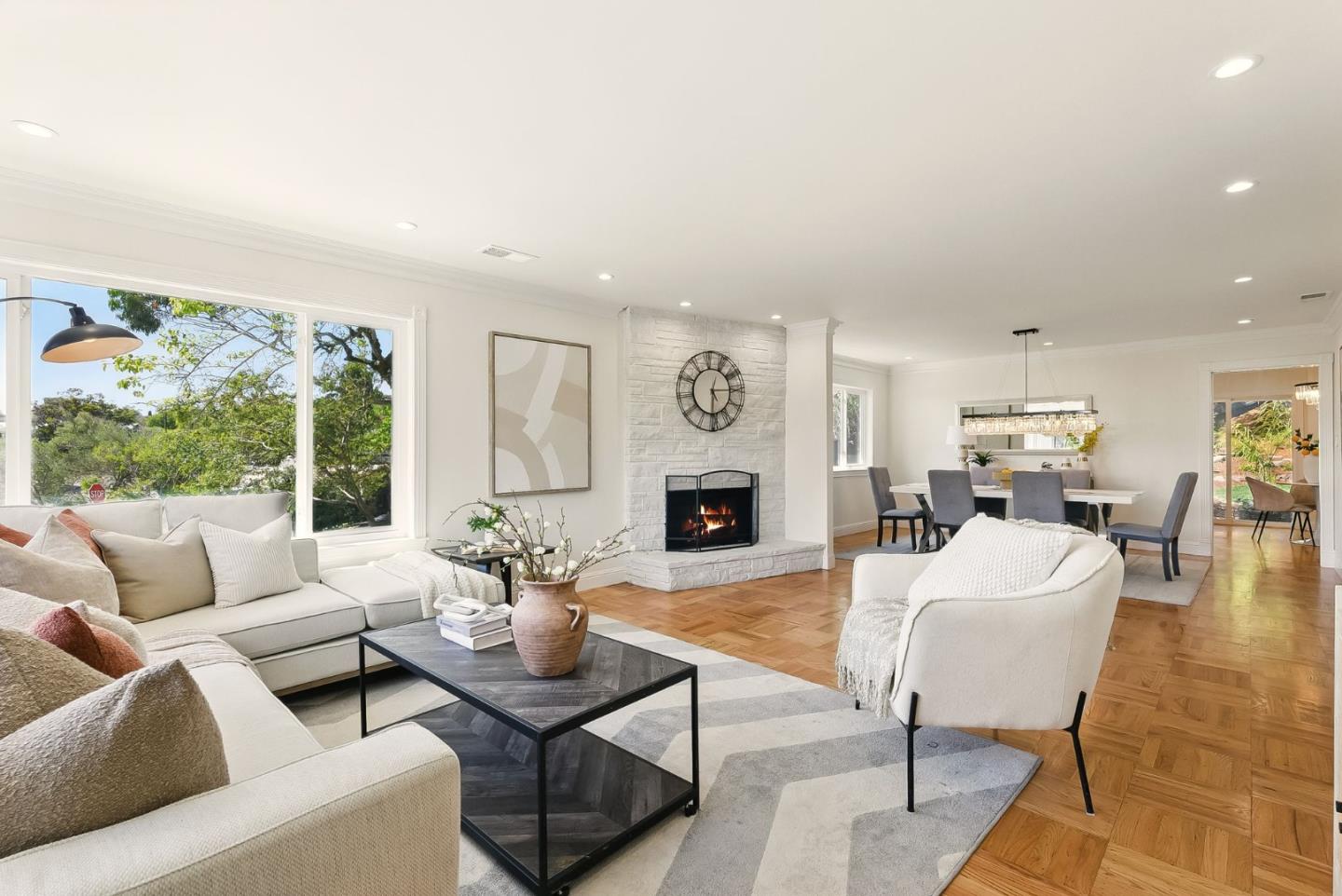 1807 Hunt Drive Burlingame, CA 94010 - Photo 8 of 46 a living room with furniture fireplace and a table