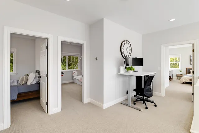 a view of workspace with livingroom view