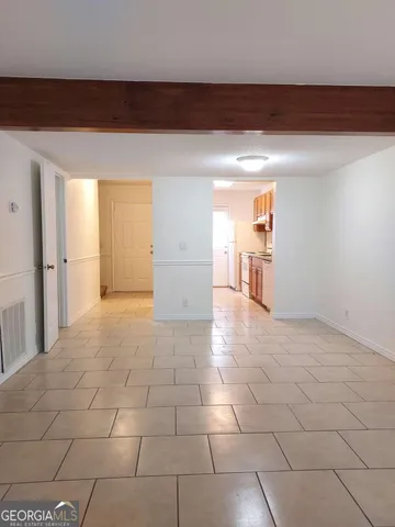 a view of a livingroom with a furniture