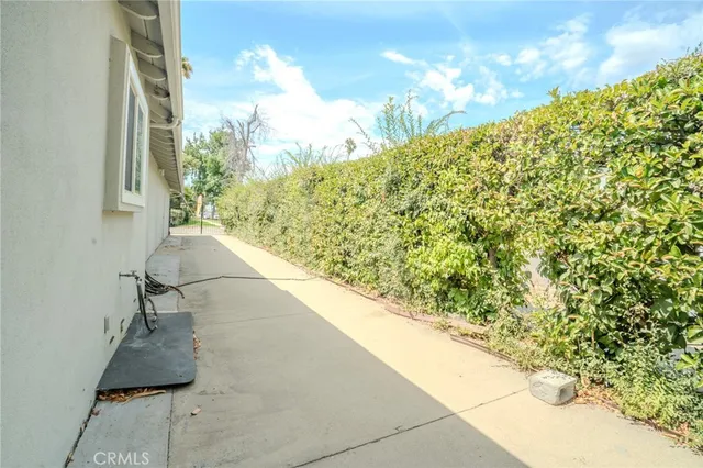 a view of backyard and basketball court