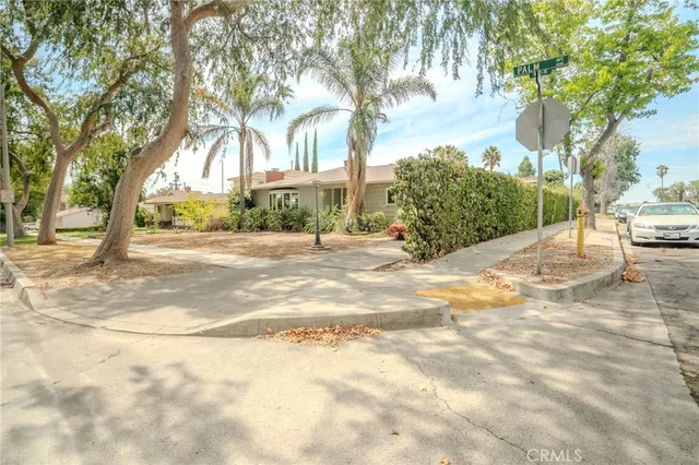 a view of a backyard of a house