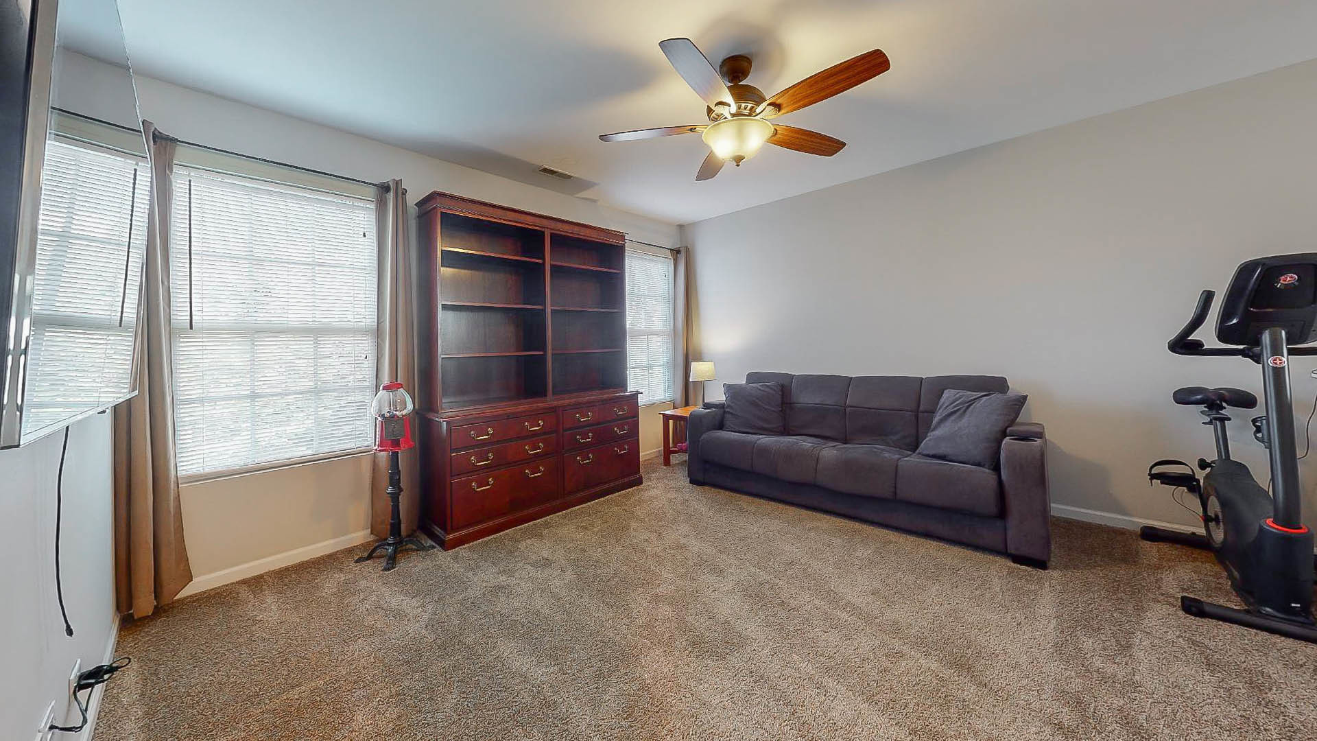 1916 West Cobblestone Road Romeoville, IL 60446 - Photo 15 of 21 a living room with furniture and a flat screen tv