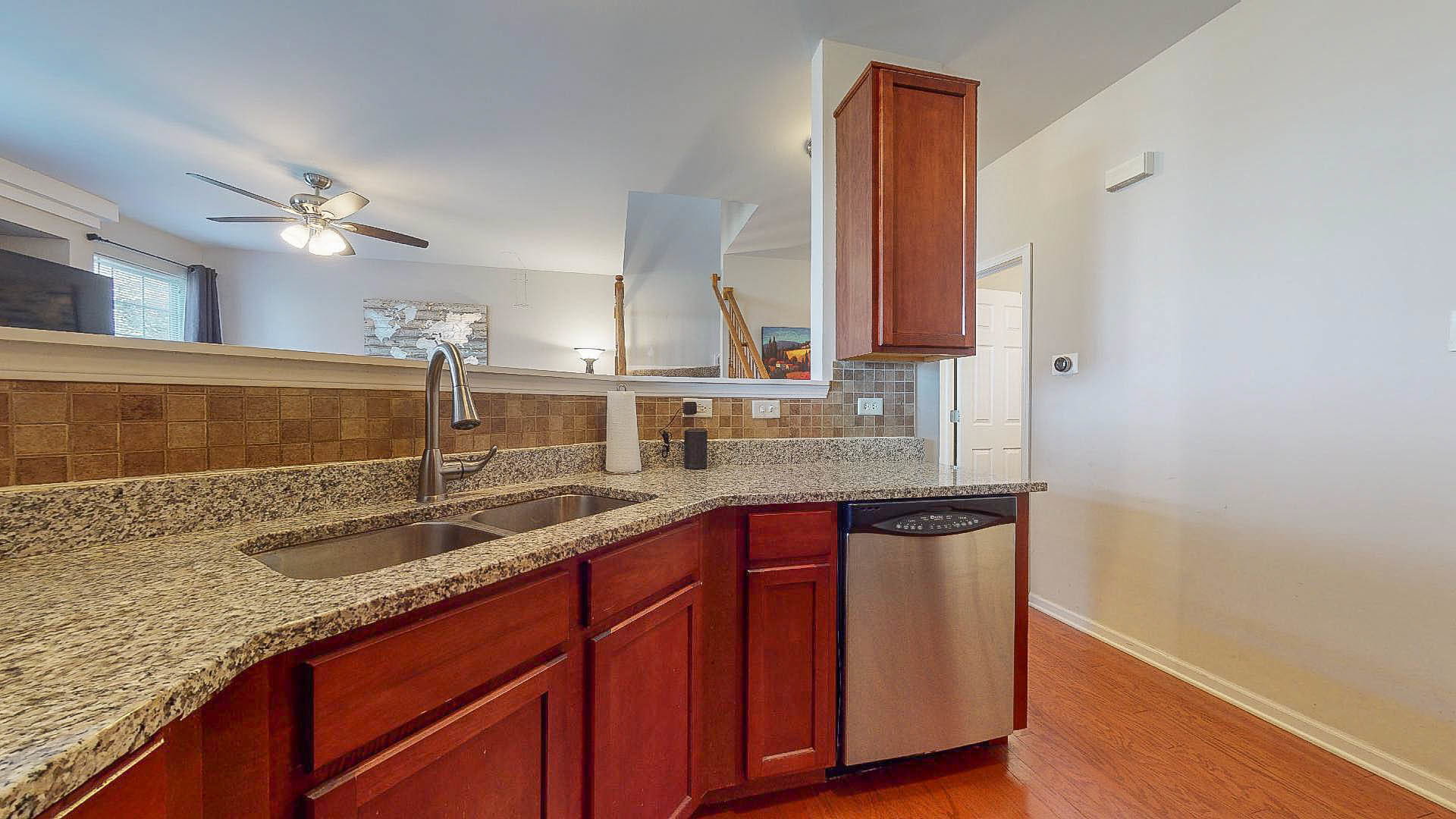 1916 West Cobblestone Road Romeoville, IL 60446 - Photo 9 of 21 a bathroom with a granite countertop sink and a mirror