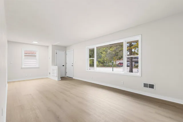 an empty room with windows