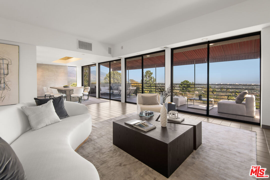 1500 Inverness Drive Pasadena, CA 91103 - Photo 18 of 66 a living room with furniture and a large window