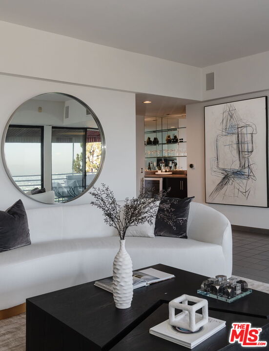 1500 Inverness Drive Pasadena, CA 91103 - Photo 19 of 66 a living room with furniture and a table