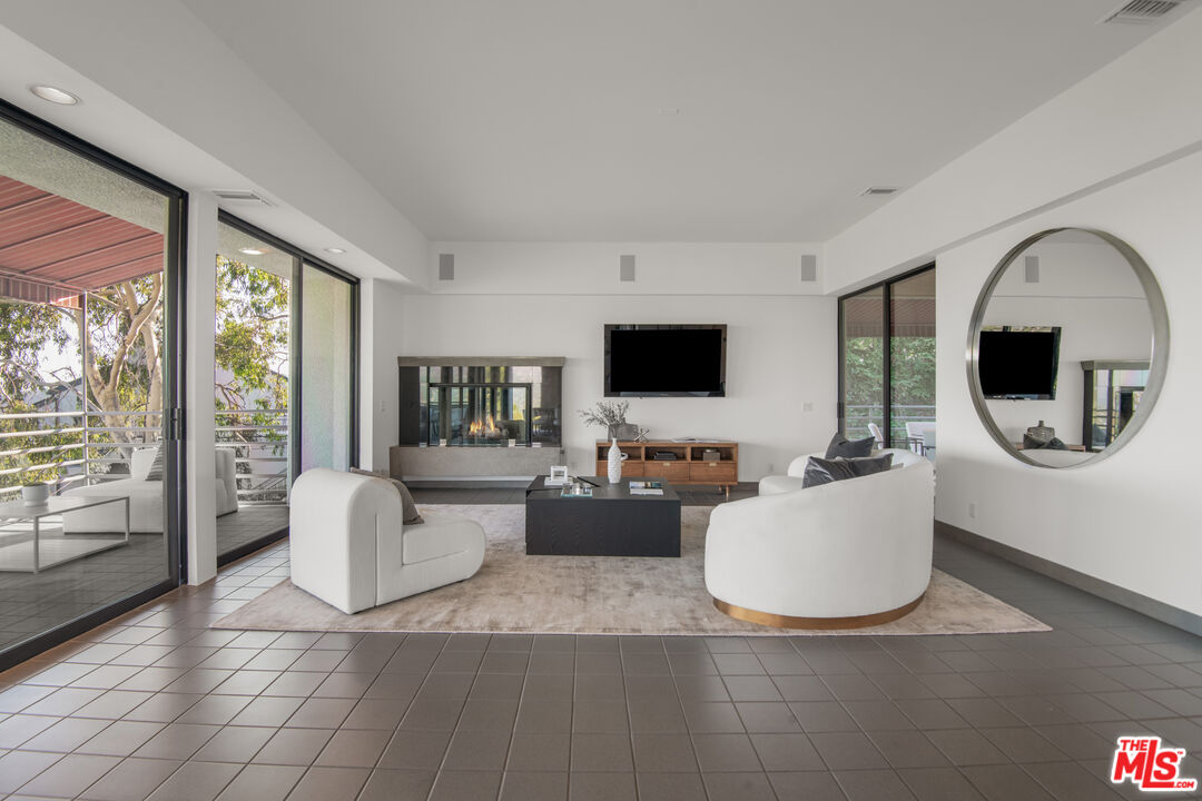 1500 Inverness Drive Pasadena, CA 91103 - Photo 20 of 66 a living room with furniture and a flat screen tv