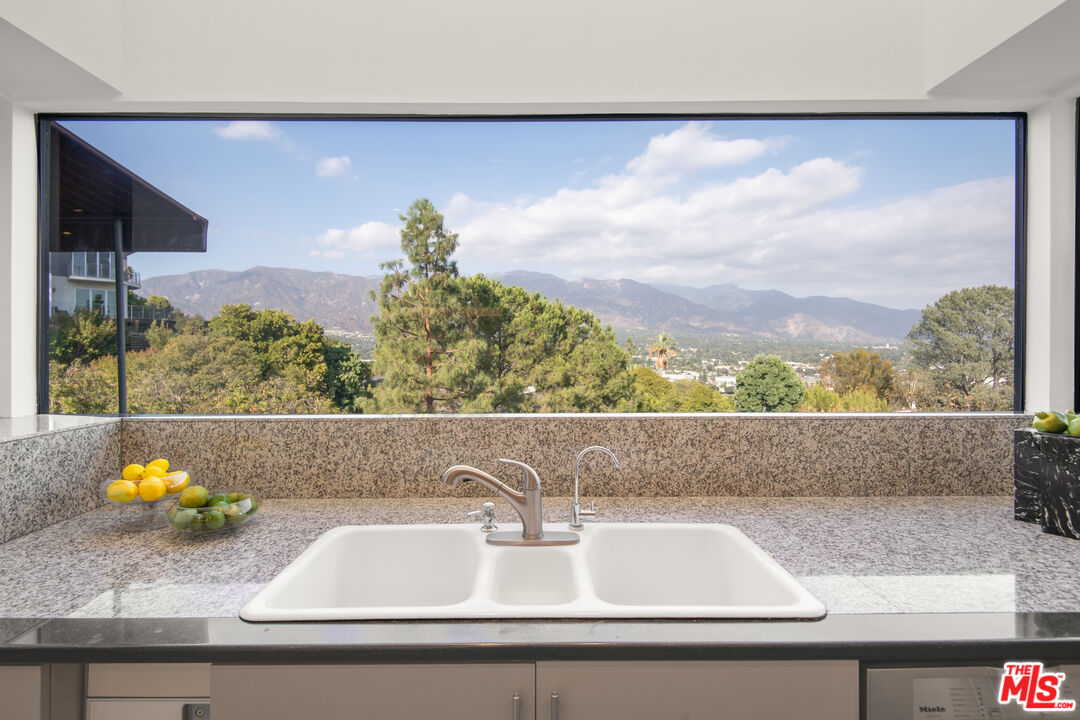 1500 Inverness Drive Pasadena, CA 91103 - Photo 27 of 66 a view of kitchen sink with wooden floor