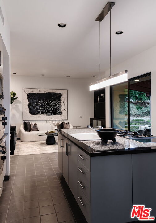 1500 Inverness Drive Pasadena, CA 91103 - Photo 29 of 66 a kitchen with a sink and a stove top oven