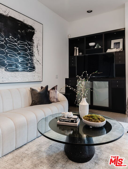 1500 Inverness Drive Pasadena, CA 91103 - Photo 31 of 66 a living room with furniture and a fireplace