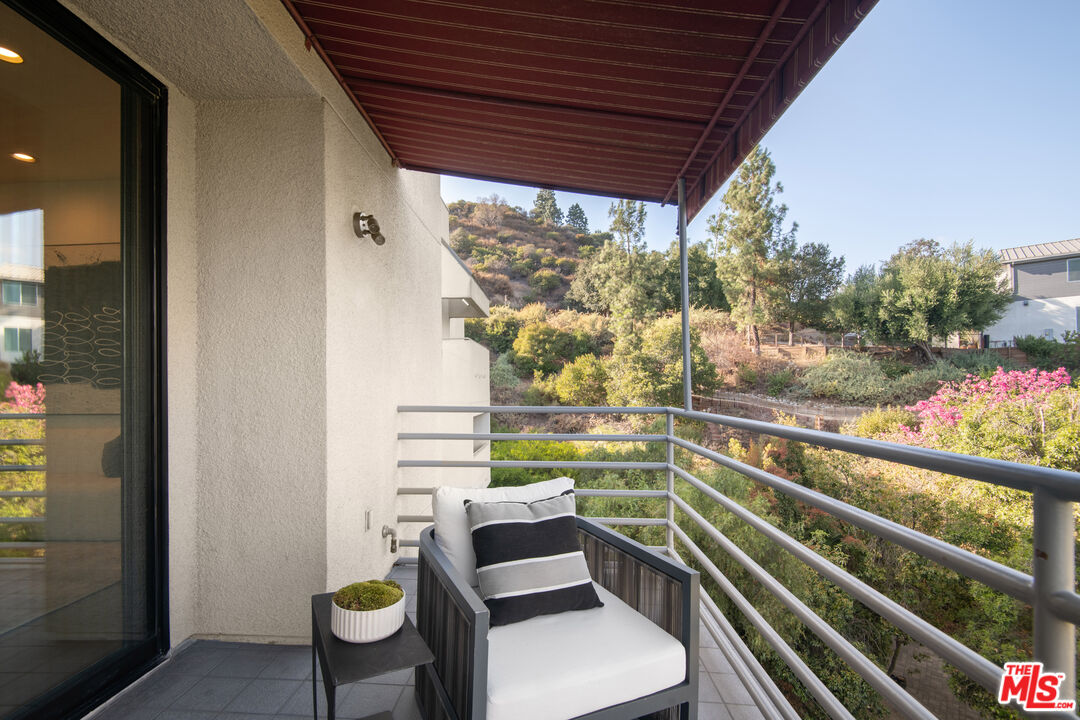 1500 Inverness Drive Pasadena, CA 91103 - Photo 32 of 66 a view of a chairs and table in the balcony