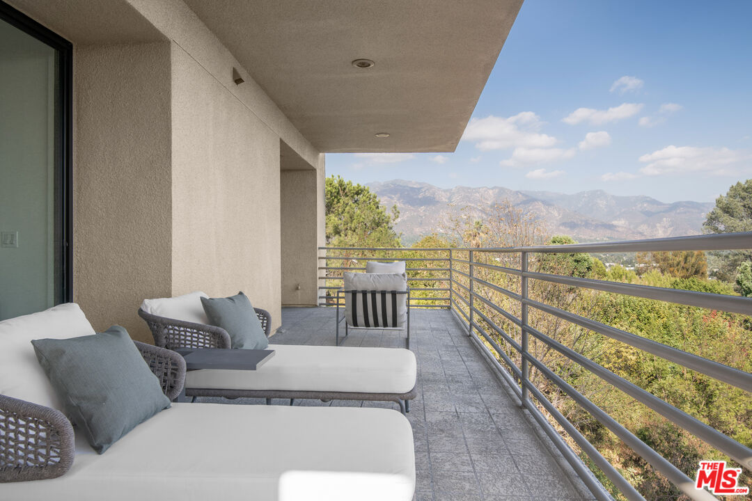 1500 Inverness Drive Pasadena, CA 91103 - Photo 43 of 66 a balcony with furniture and city view