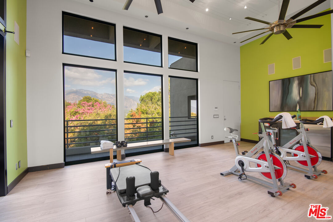 1500 Inverness Drive Pasadena, CA 91103 - Photo 54 of 66 a bedroom with furniture and a flat screen tv