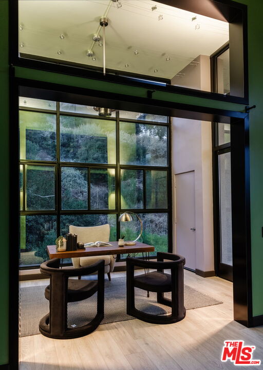 1500 Inverness Drive Pasadena, CA 91103 - Photo 56 of 66 a living room with large window and a table