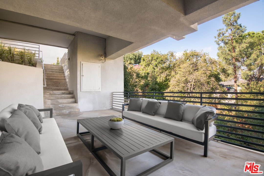 1500 Inverness Drive Pasadena, CA 91103 - Photo 58 of 66 a living room with furniture and a large window