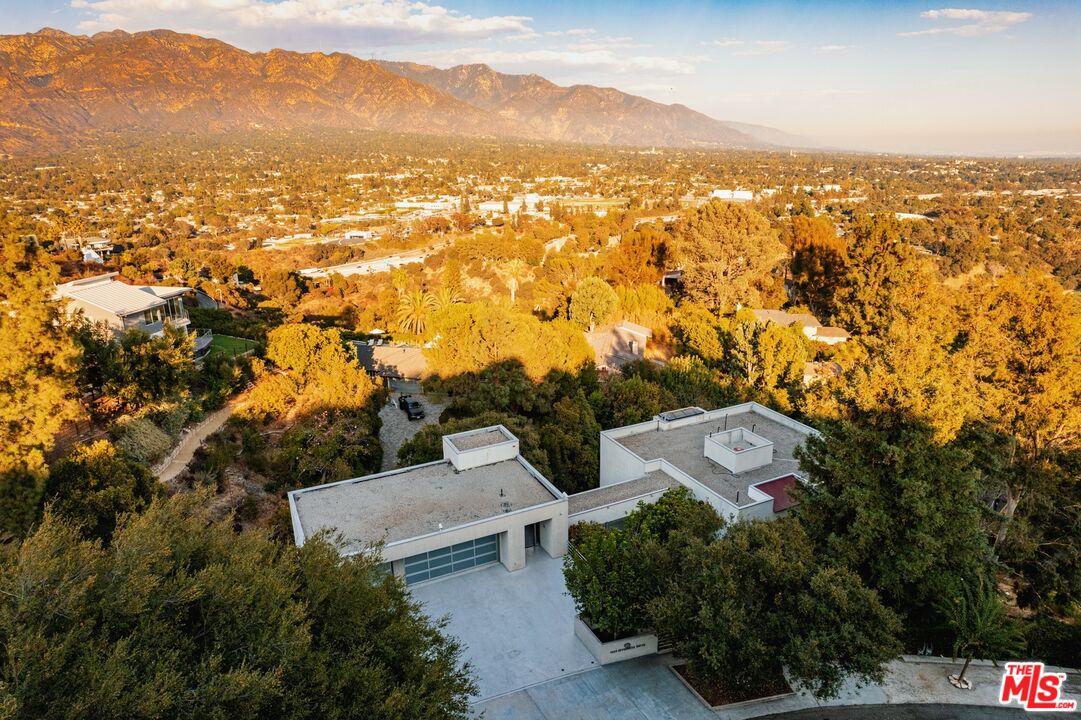 1500 Inverness Drive Pasadena, CA 91103 - Photo 62 of 66 an aerial view of residential houses with outdoor space and trees