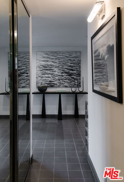 1500 Inverness Drive Pasadena, CA 91103 - Photo 10 of 66 a view of a hallway with paintings on the wall