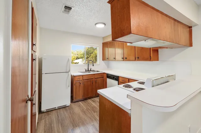 a utility room with washer and dryer