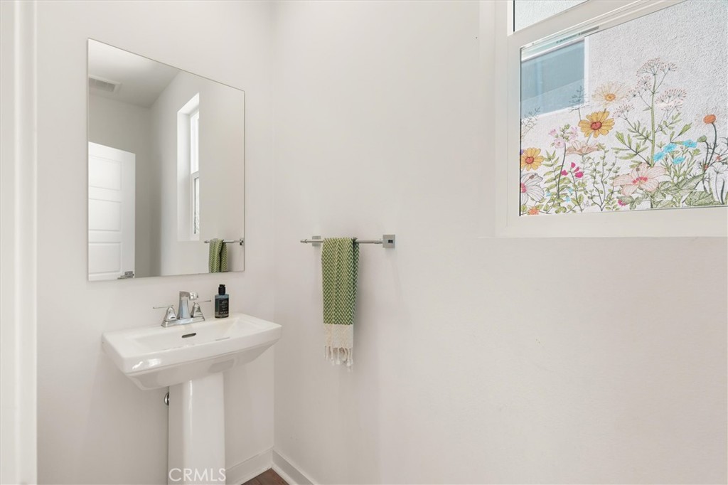 540 Sparrowhawk Way Rancho Mission Viejo, CA 92694 - Photo 16 of 54 a bathroom with a sink and mirror