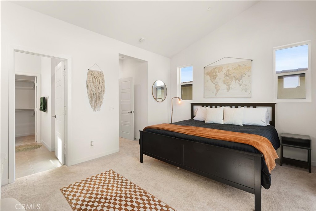540 Sparrowhawk Way Rancho Mission Viejo, CA 92694 - Photo 19 of 54 a bedroom with a bed and walk in closet