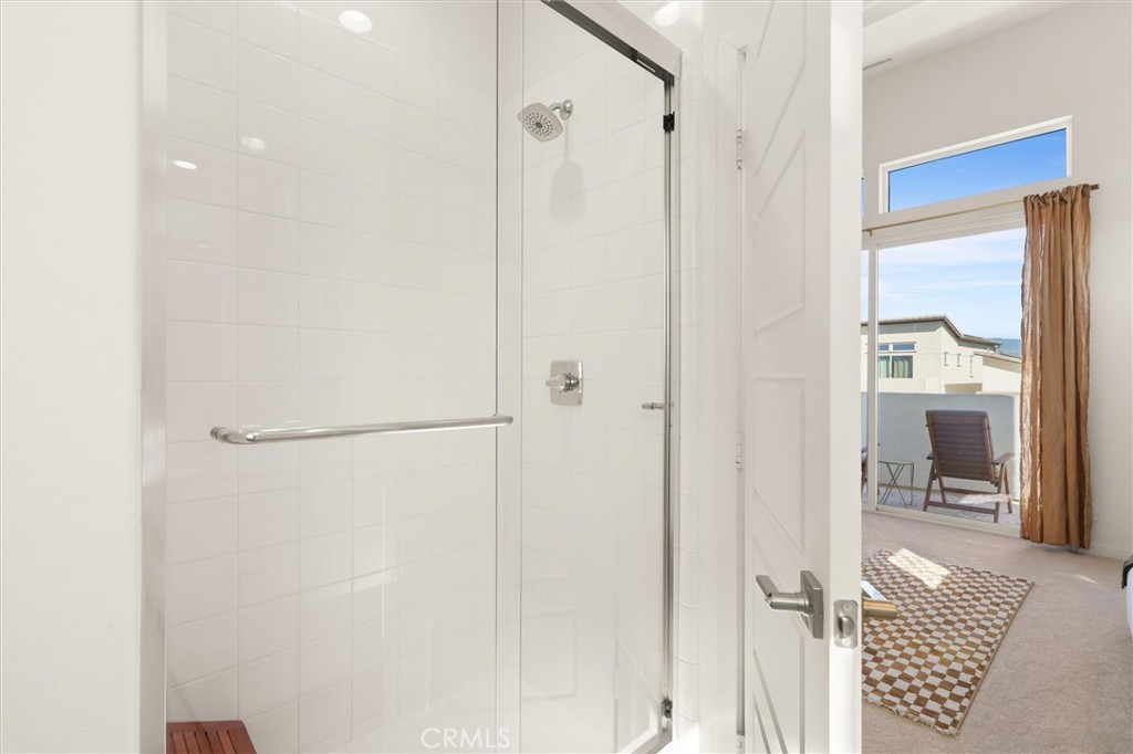 540 Sparrowhawk Way Rancho Mission Viejo, CA 92694 - Photo 21 of 54 a bathroom with a shower and a glass door