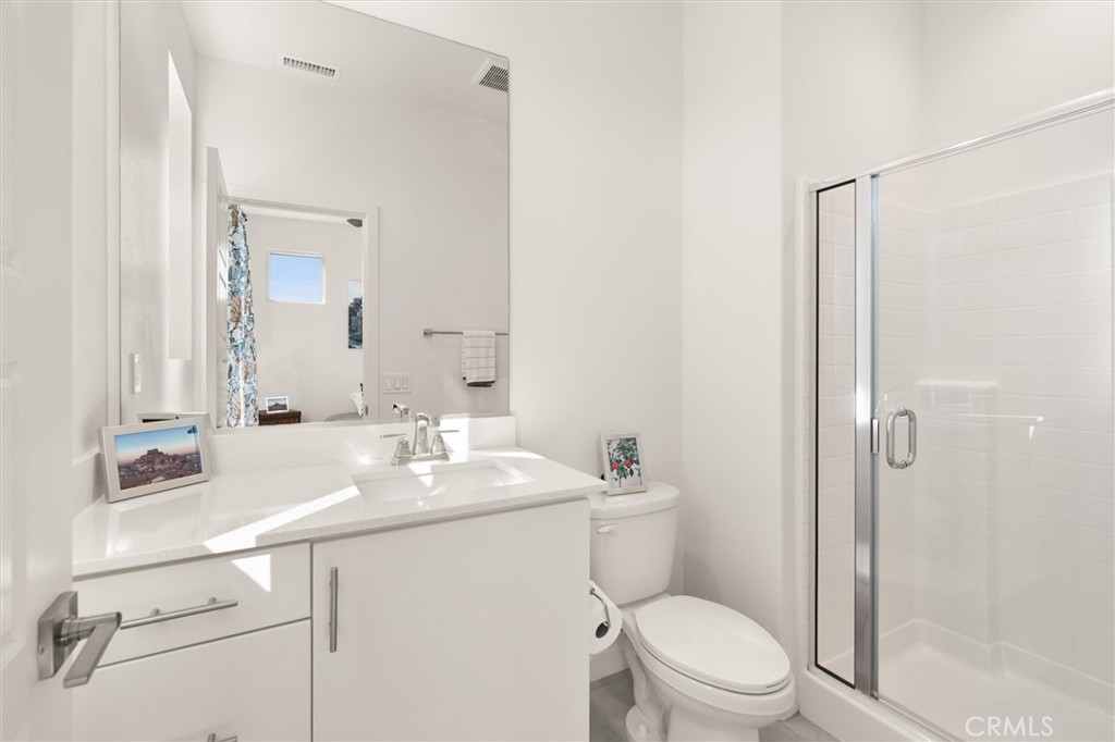540 Sparrowhawk Way Rancho Mission Viejo, CA 92694 - Photo 26 of 54 a bathroom with a sink toilet vanity and shower