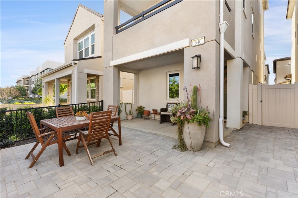 540 Sparrowhawk Way Rancho Mission Viejo, CA 92694 - Photo 28 of 54 a view of a patio with a table and chairs in patio