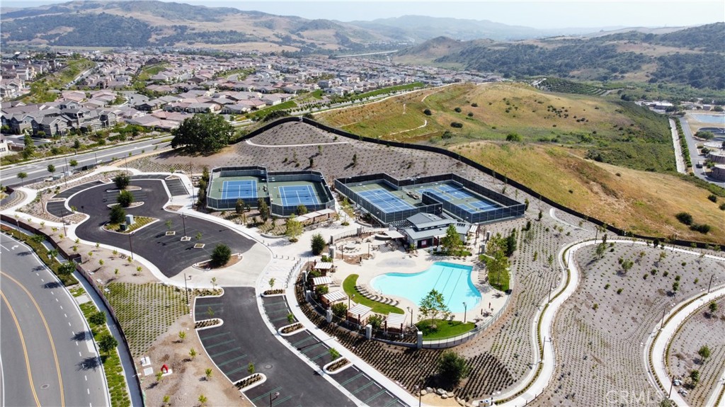 540 Sparrowhawk Way Rancho Mission Viejo, CA 92694 - Photo 41 of 54 an aerial view of a swimming pool with a table and chairs