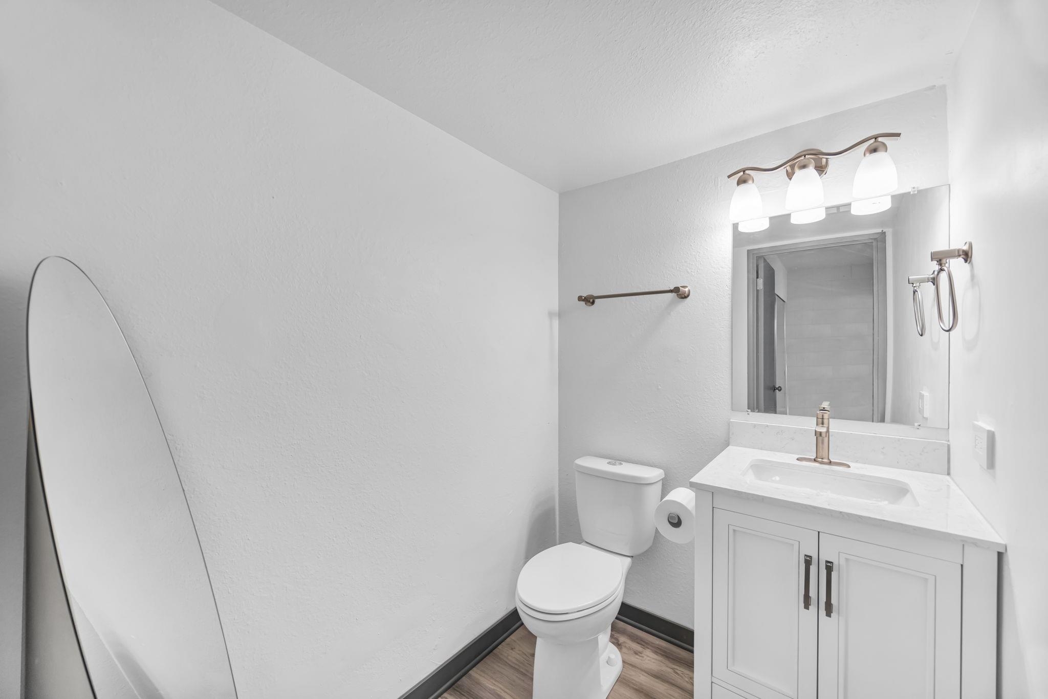 111 Kahului Beach Road, Unit A310 Kahului, HI 96732 - Photo 18 of 24 a bathroom with a sink toilet and mirror