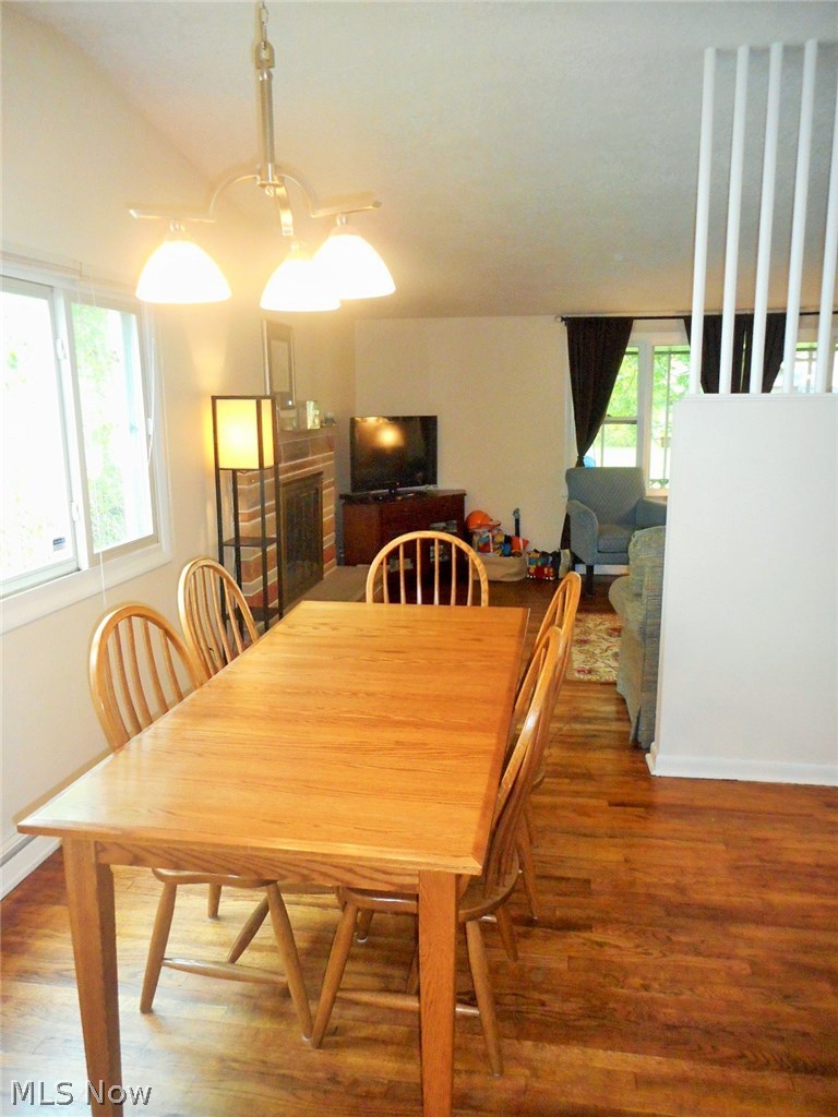 658 Garnette Road Akron, OH 44313 - Photo 7 of 24 Opens from vaulted ceiling living room.