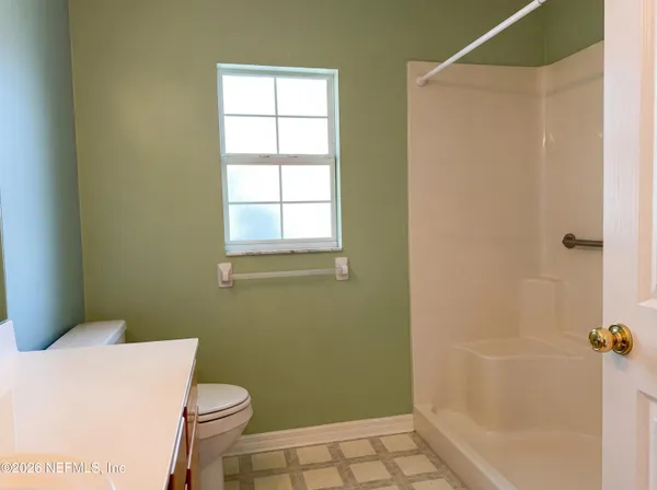 a bathroom with a sink and a toilet
