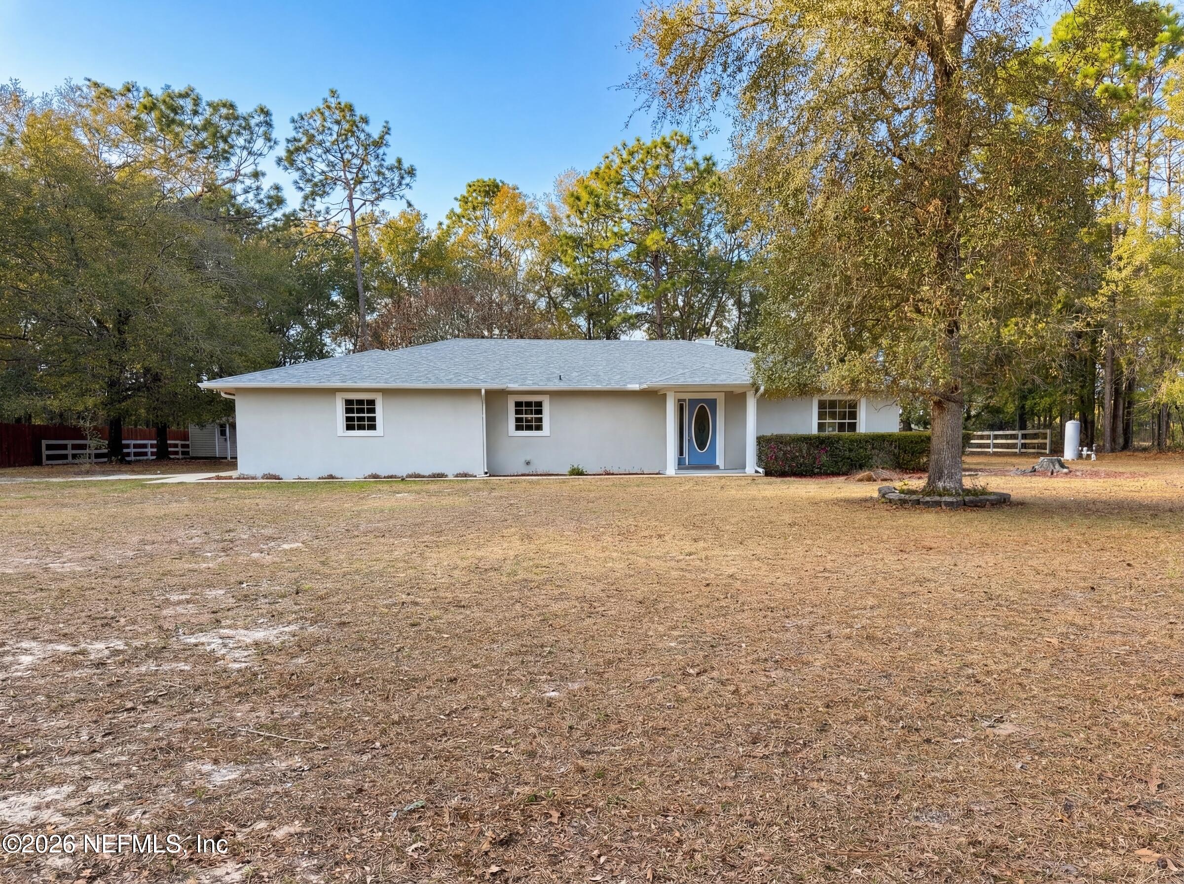 7628 Alameda Way Keystone Heights, FL 32656 - Photo 6 of 29 a house view with a backyard space