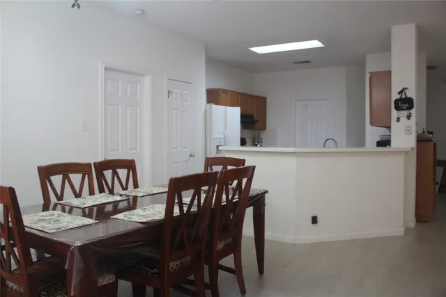 a view of a dining room with furniture