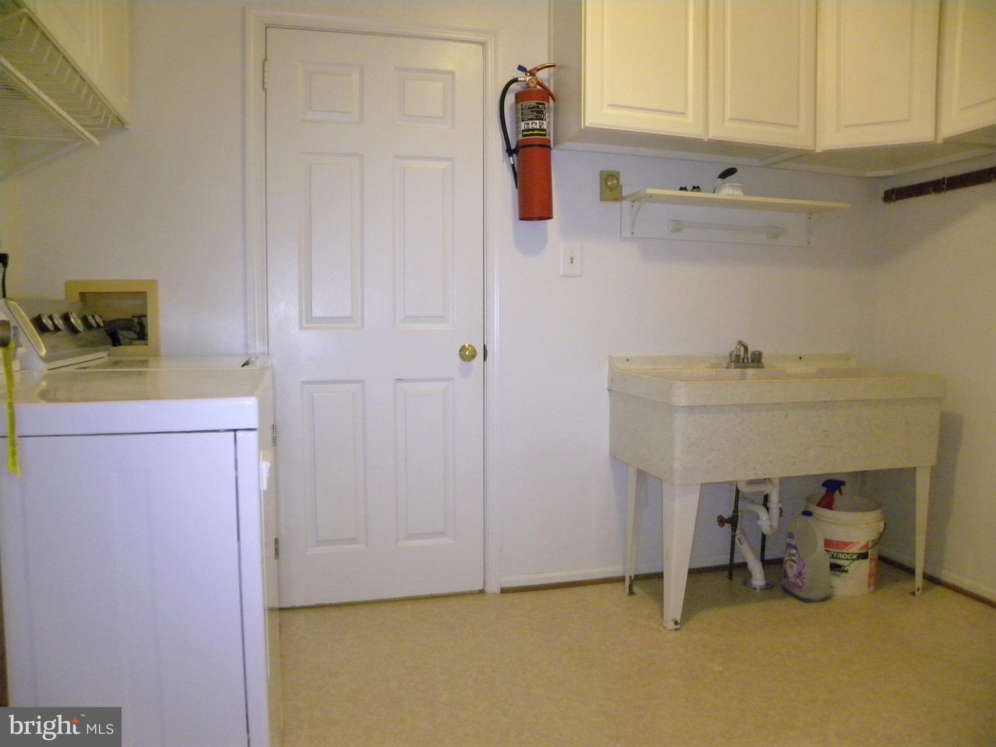 7415 Bull Run Road Manassas, VA 20111 - Photo 19 of 30 a room with storage and utility