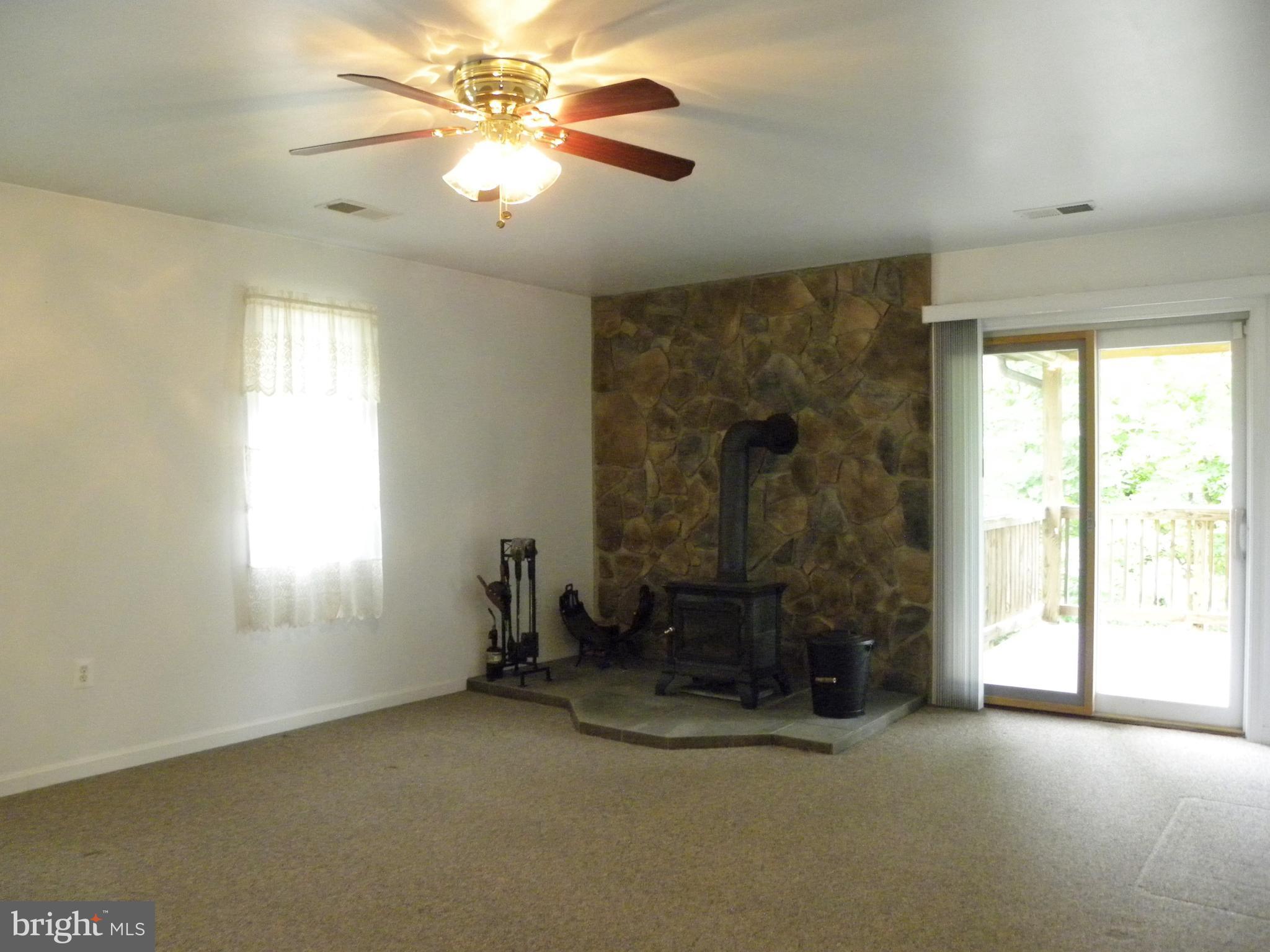 7415 Bull Run Road Manassas, VA 20111 - Photo 29 of 30 an empty room with windows and fan