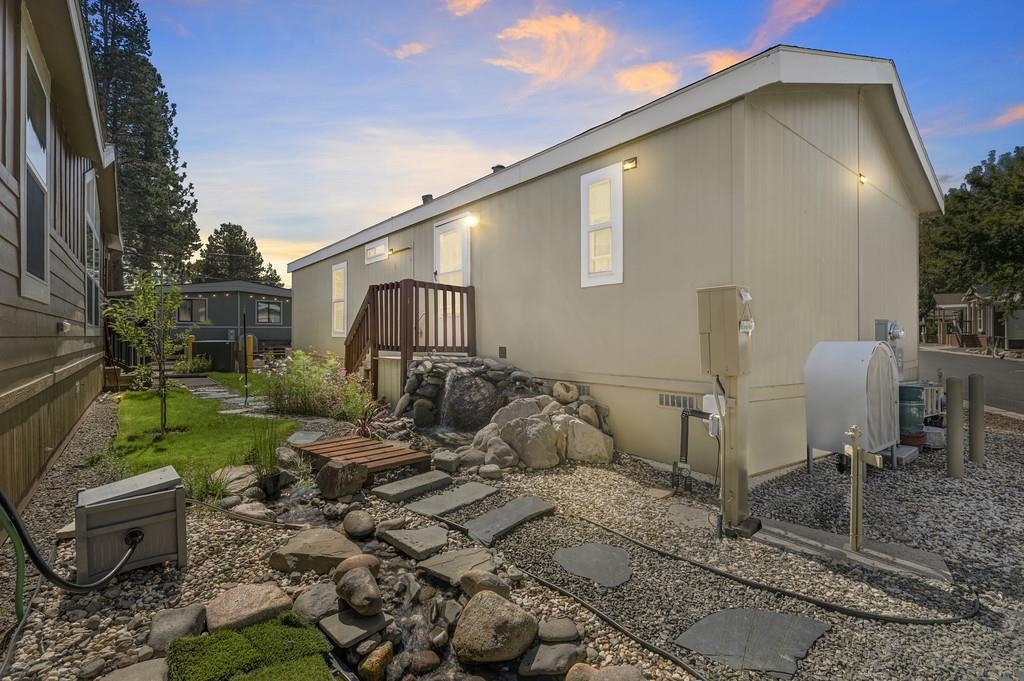 1080 Julie Lane, Unit 255 South Lake Tahoe, CA 96150 - Photo 3 of 26 a front view of a house with garden