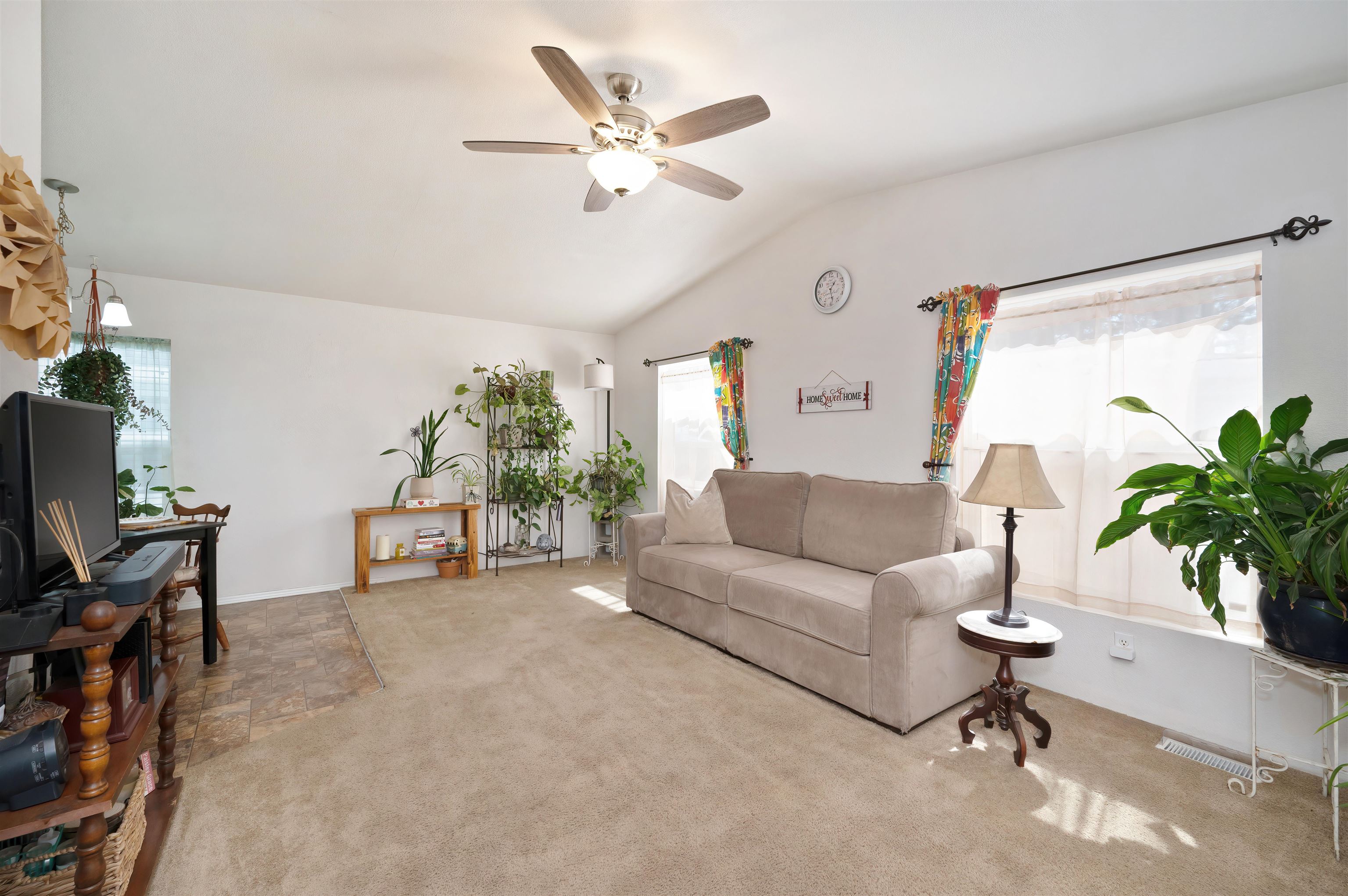 1080 Julie Lane, Unit 255 South Lake Tahoe, CA 96150 - Photo 6 of 26 a living room with furniture a chandelier and a large window