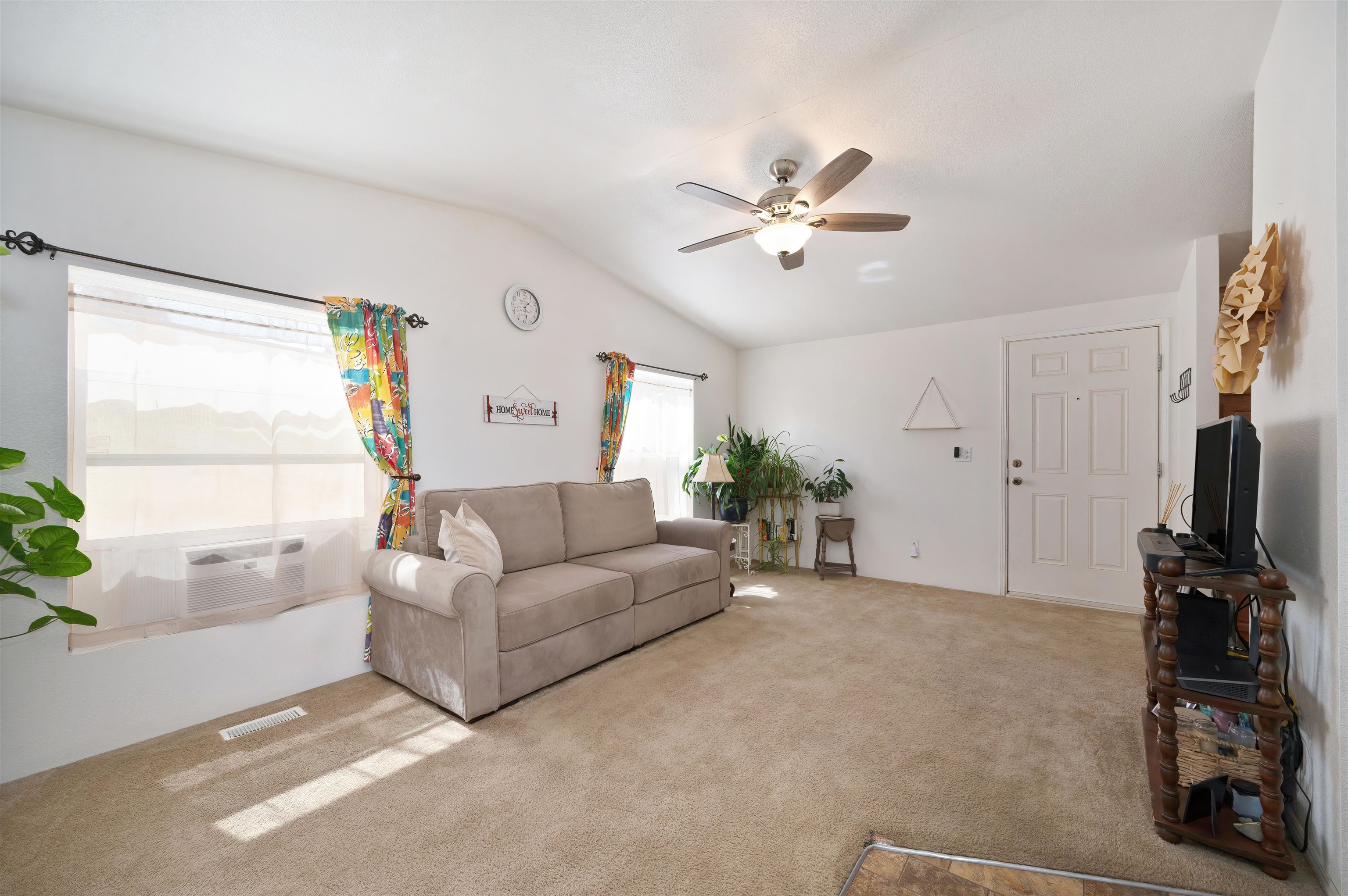 1080 Julie Lane, Unit 255 South Lake Tahoe, CA 96150 - Photo 7 of 26 a living room with furniture a ceiling fan and a window