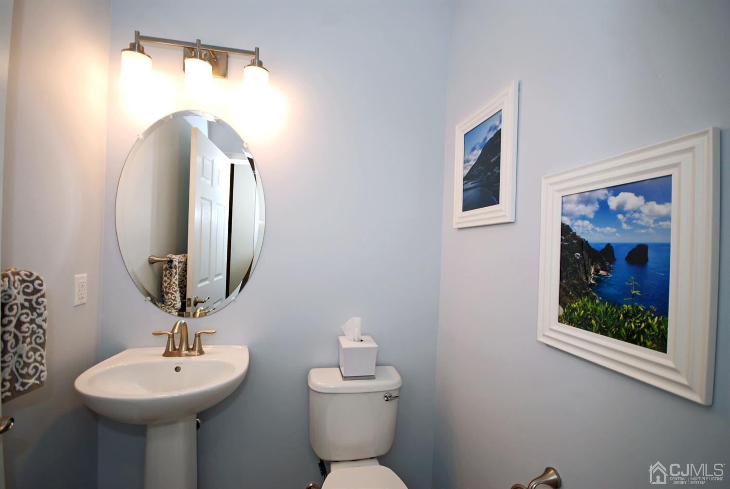 9 Flagger Lane Hamilton, NJ 08619 - Photo 11 of 24 a bathroom with a toilet sink and mirror