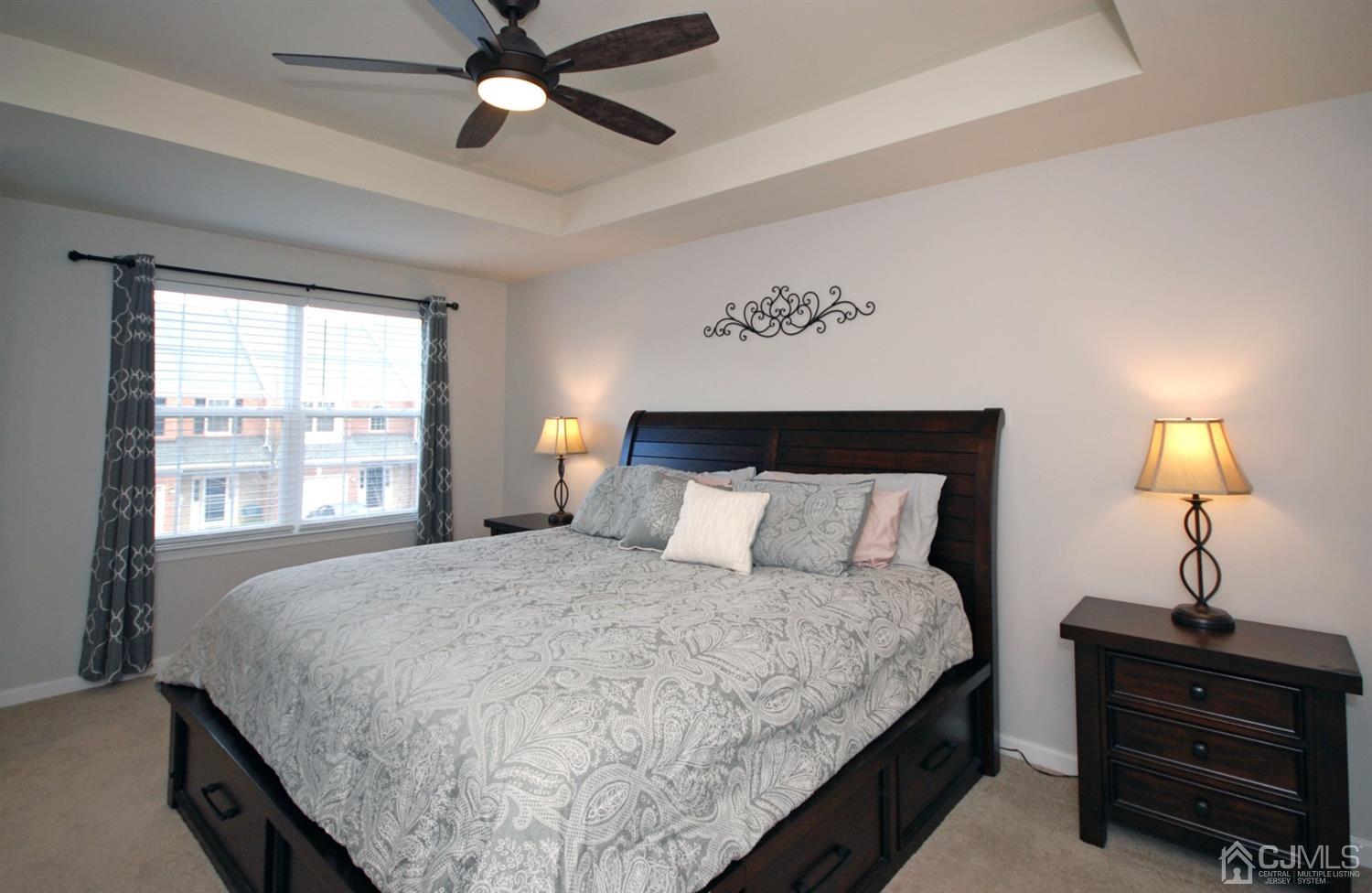9 Flagger Lane Hamilton, NJ 08619 - Photo 13 of 24 a bedroom with a bed and window