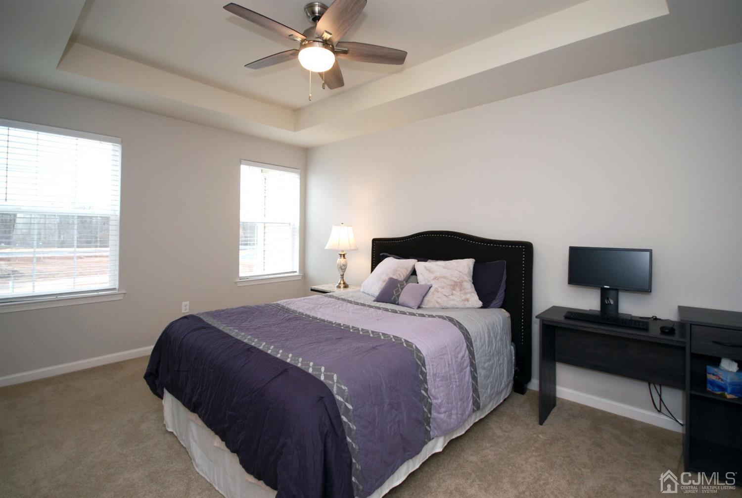 9 Flagger Lane Hamilton, NJ 08619 - Photo 17 of 24 a bedroom with a bed and a window