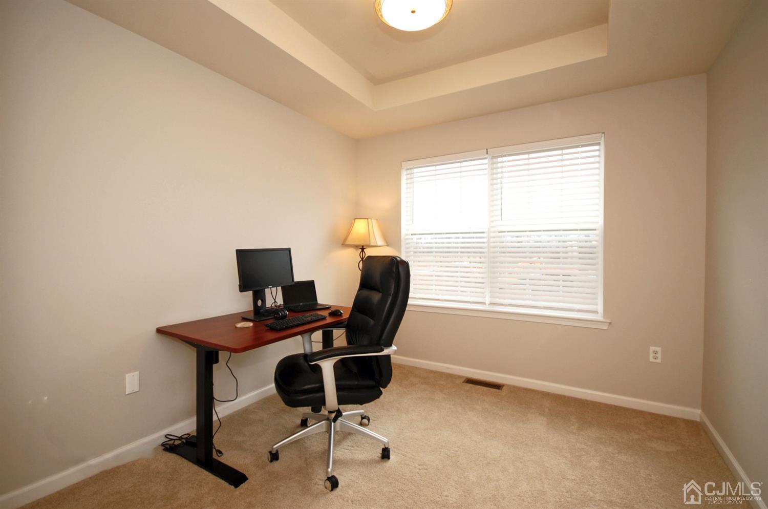 9 Flagger Lane Hamilton, NJ 08619 - Photo 19 of 24 a view of a workspace with furniture and a window