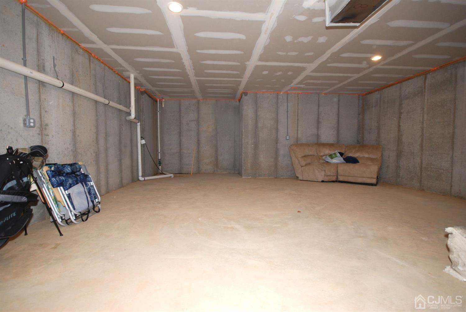 9 Flagger Lane Hamilton, NJ 08619 - Photo 23 of 24 a room with storage and a furniture
