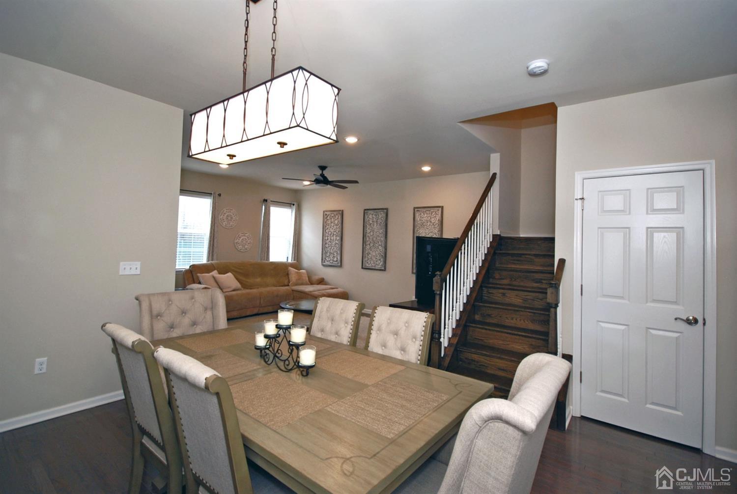 9 Flagger Lane Hamilton, NJ 08619 - Photo 5 of 24 a view of a dining room with furniture and wooden floor