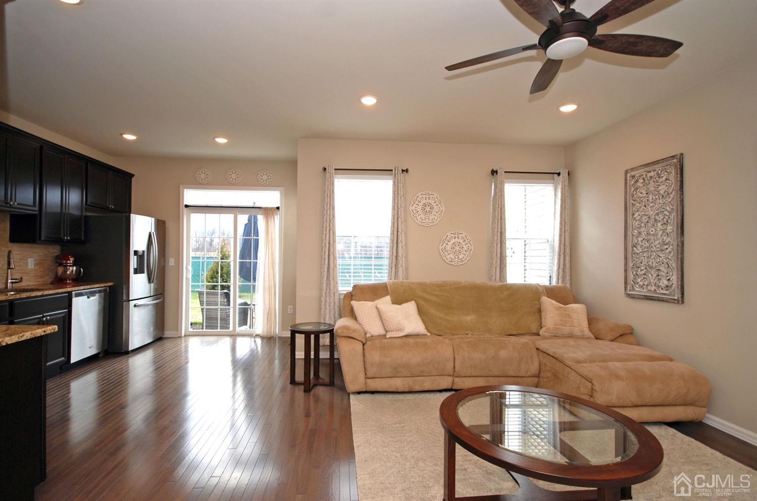 9 Flagger Lane Hamilton, NJ 08619 - Photo 10 of 24 a living room with furniture and a wooden floor