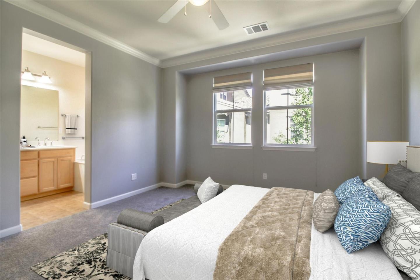 5306 Fioli Loop San Ramon, CA 94582 - Photo 5 of 14 a bedroom with a bed and a window